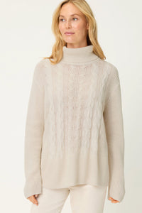 Col roulé classique en maille torsadée