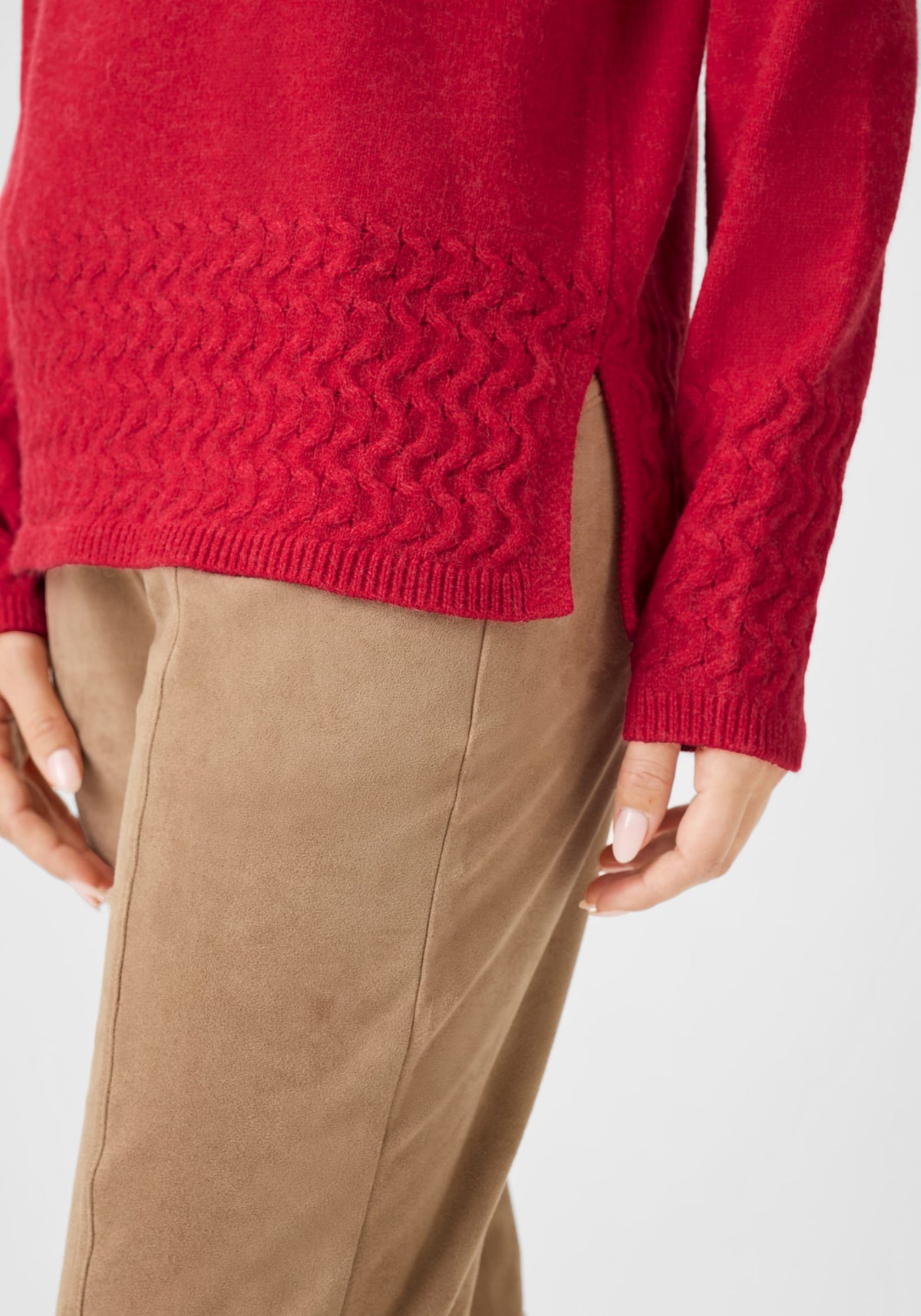 Pull à col cheminée avec bordures en tricot torsadé