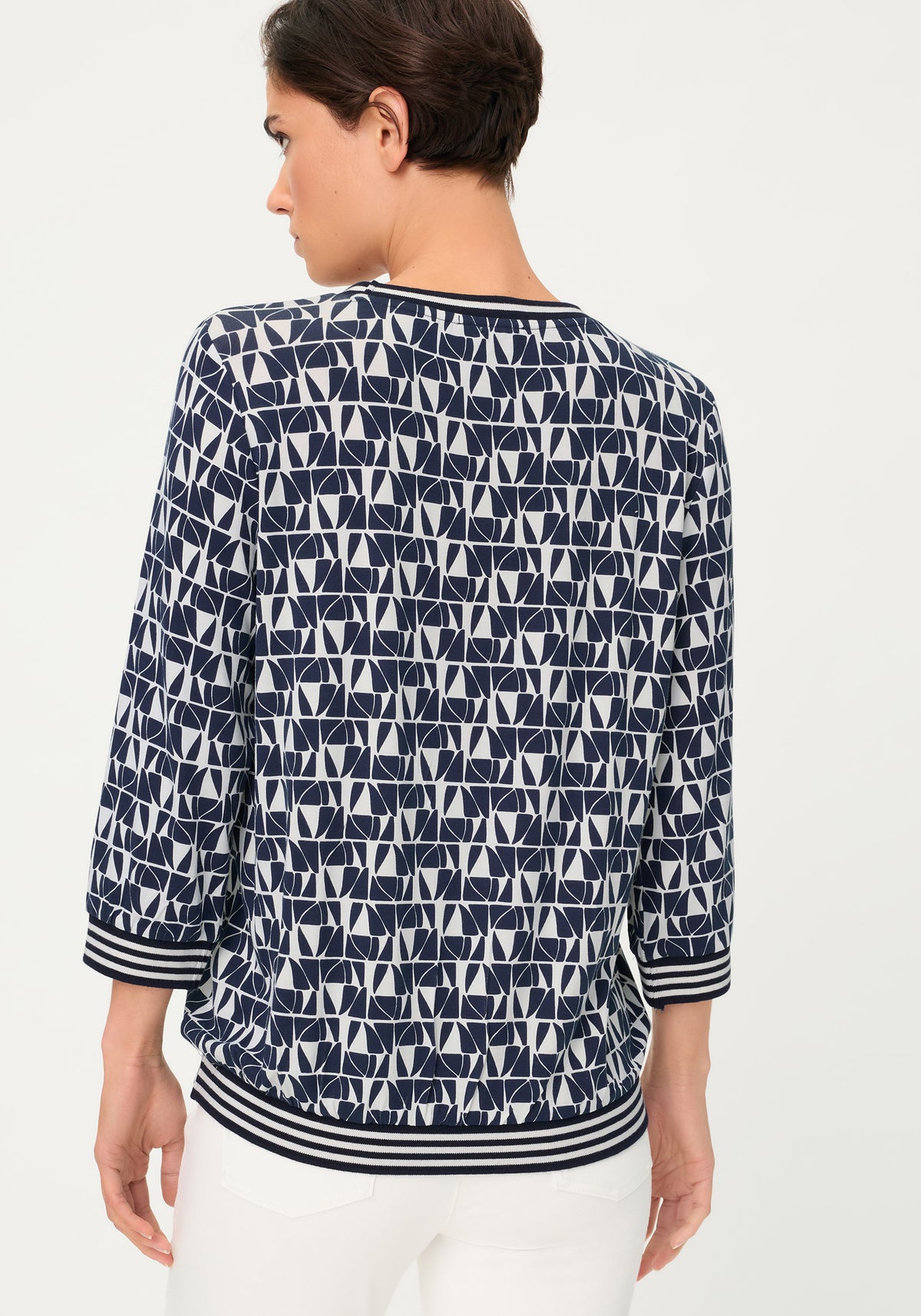 T-shirt à imprimé géométrique intégral avec bordure rayée