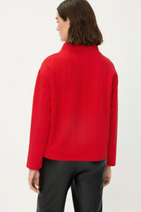 Pull à col cheminée avec bordures en tricot torsadé
