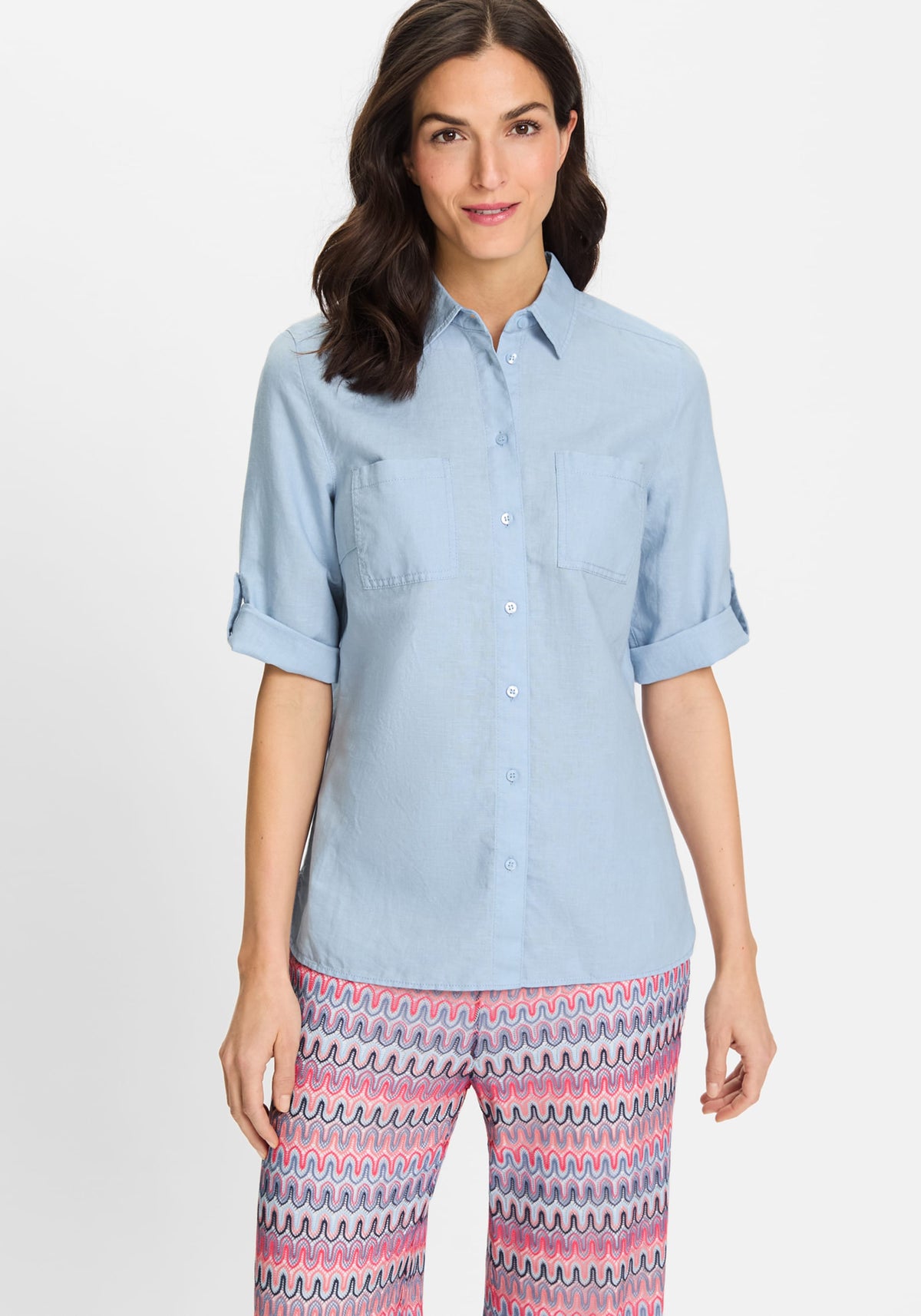 Chemise à pattes de boutonnage à manches roulées