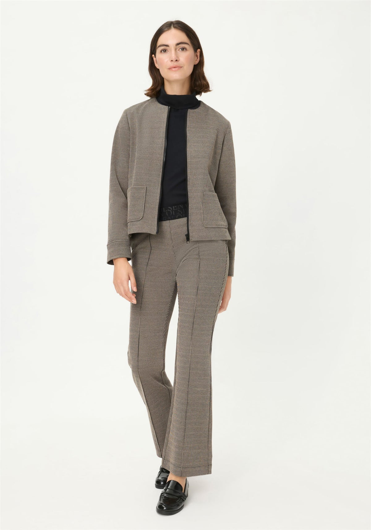 Veste à carreaux zippée