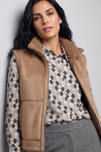 Gilet réversible en simili-daim et sherpa